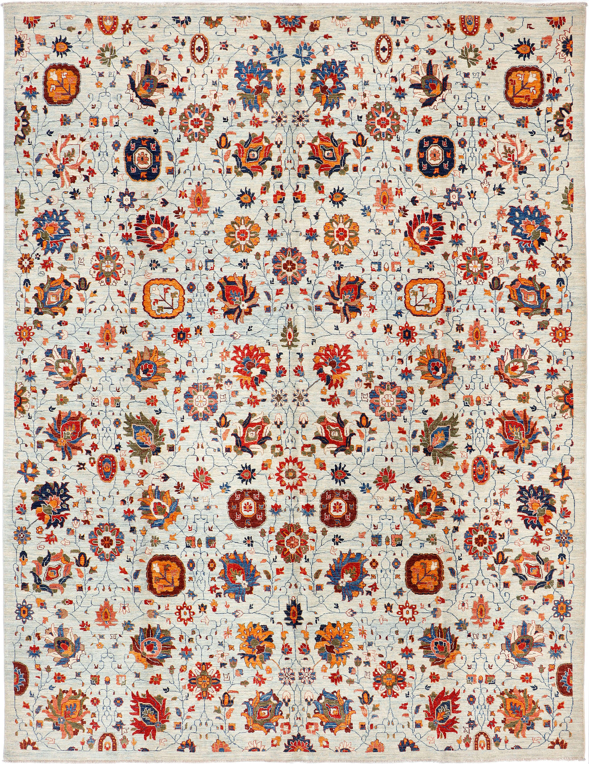 A handmade 10x12 wool rug featuring an all-over floral pattern.