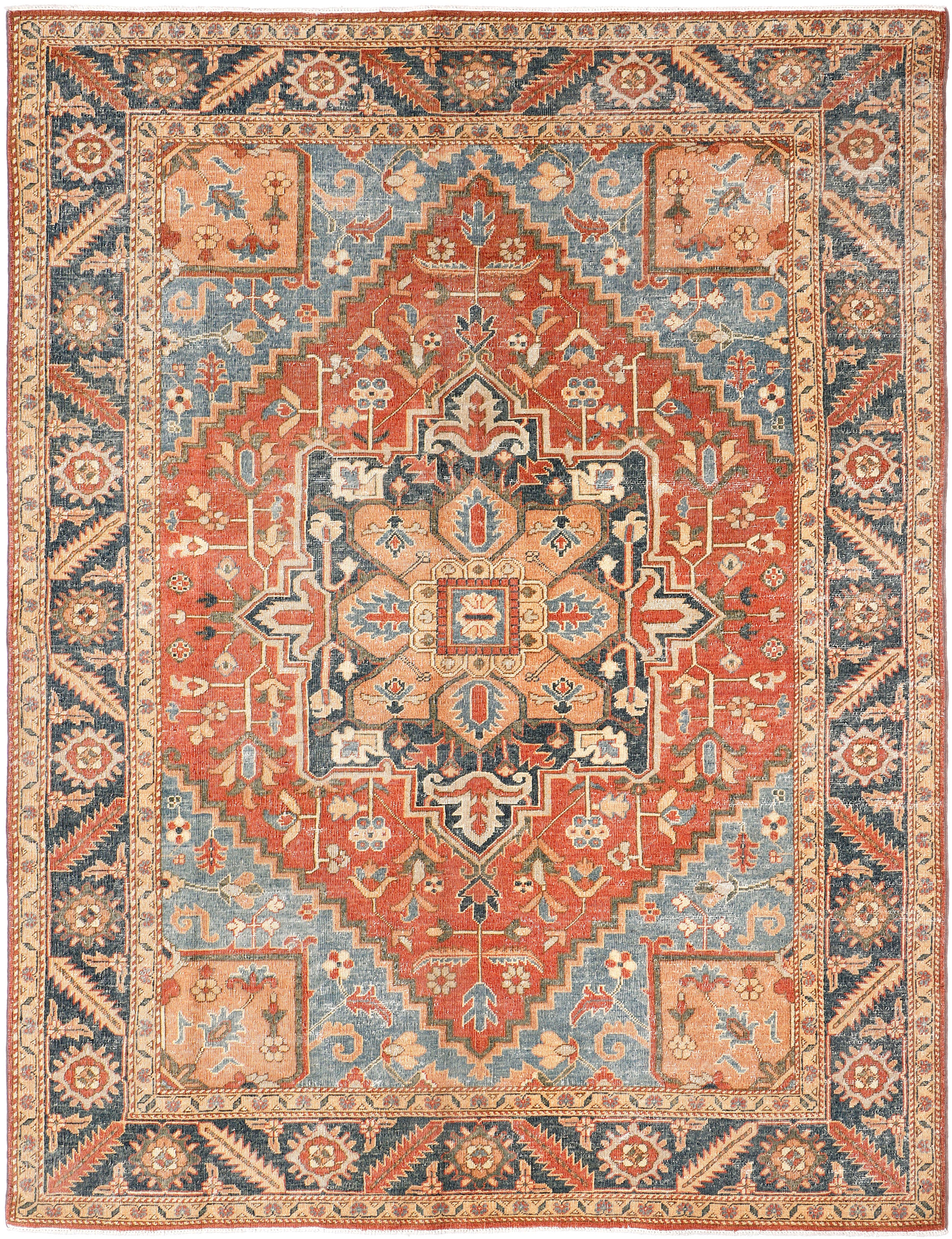 A hand-knotted antique-style wool rug featuring a classic Serapi design.