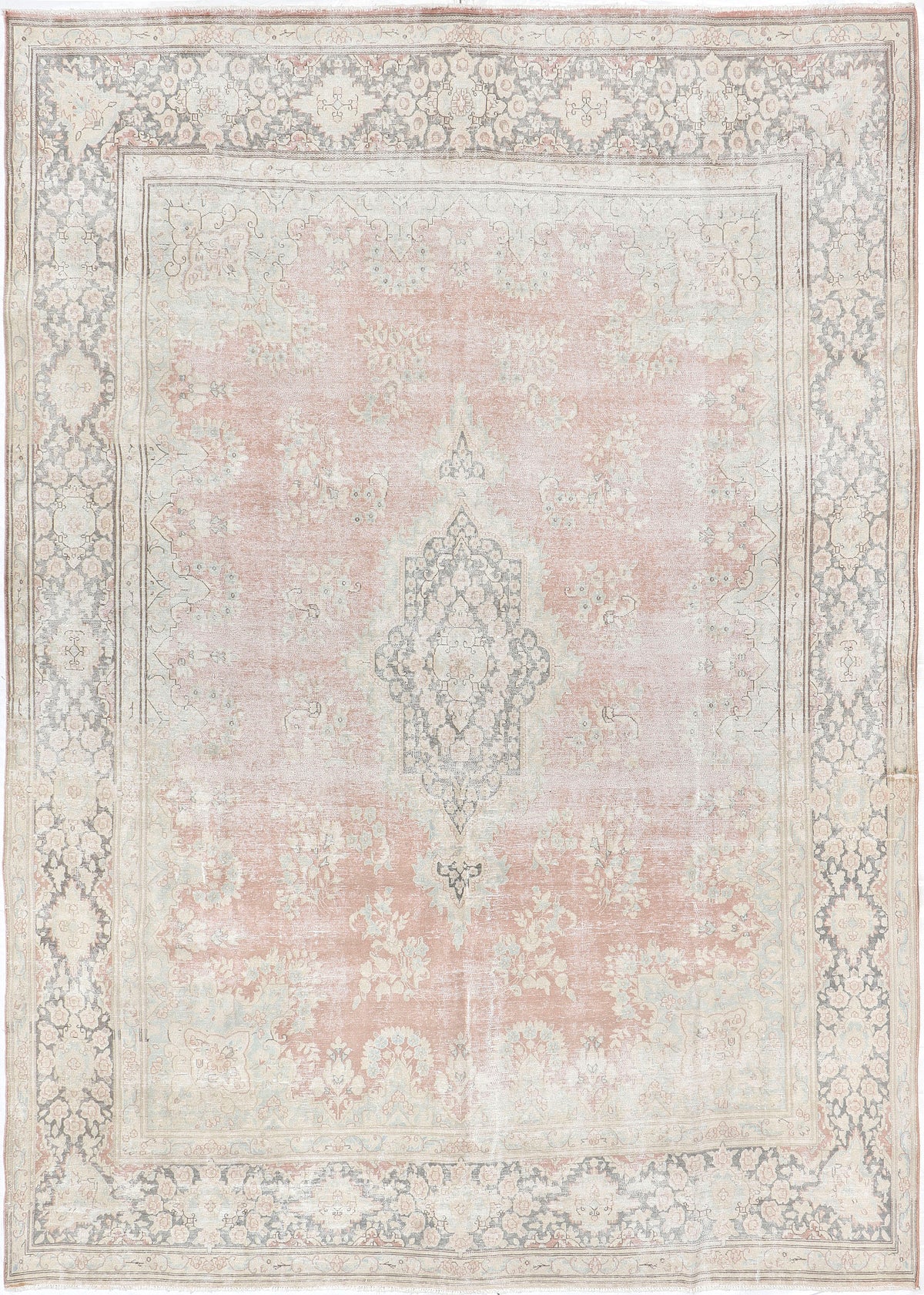 A hand-knotted 10x13 vintage wool rug featuring a blush colour combination.