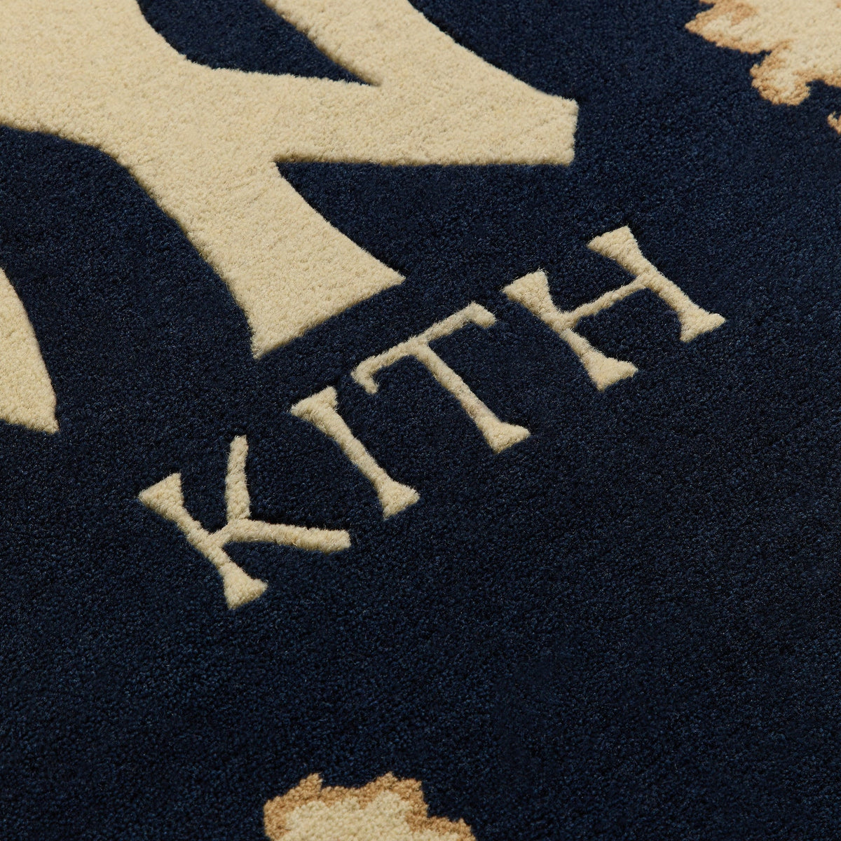 A hand-knotted Yankees rug by Kasra Rugs x Kith in a red colour combination.