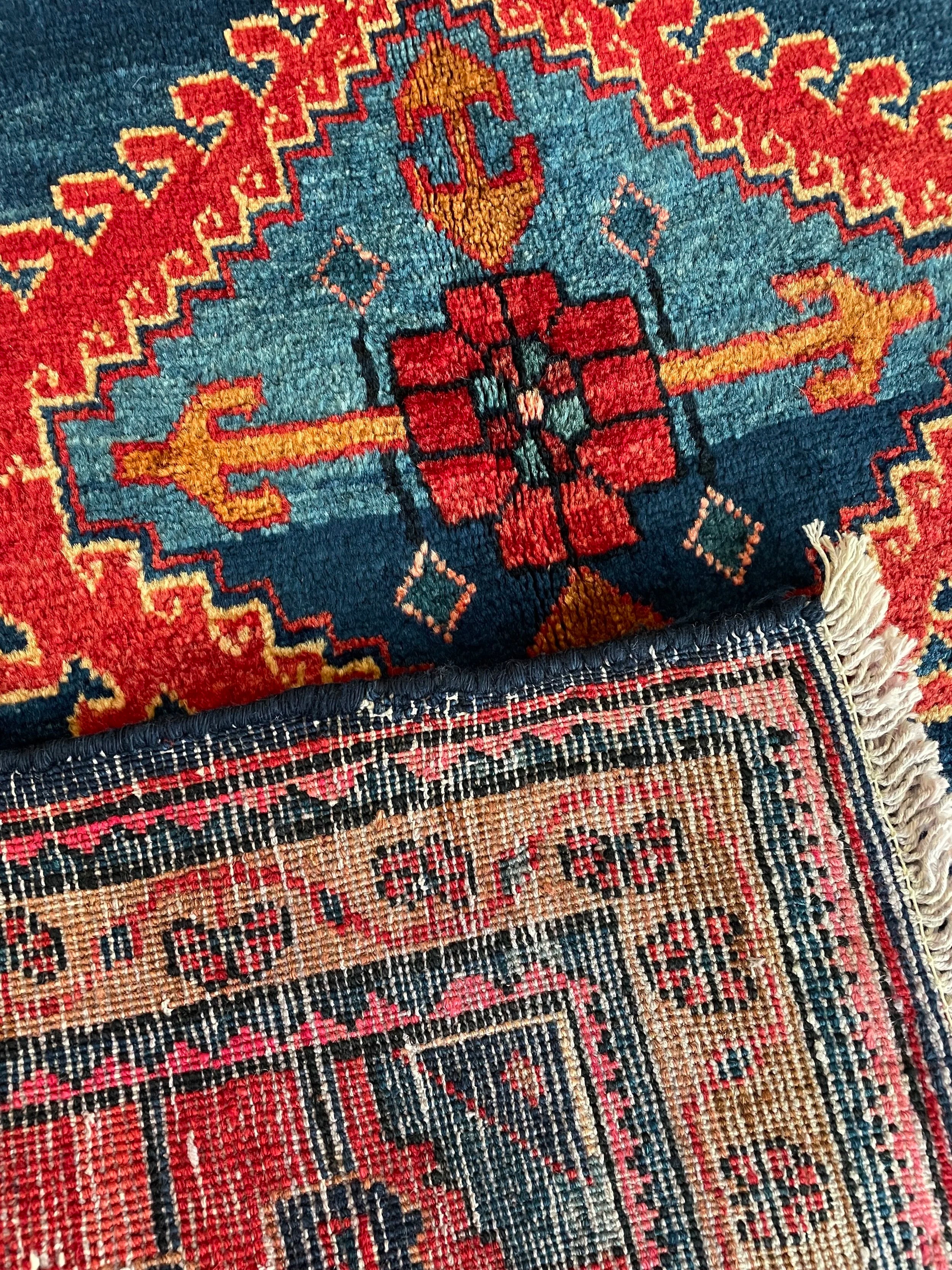 Viss Tribal Wool Rug (3'10" x 5'0")