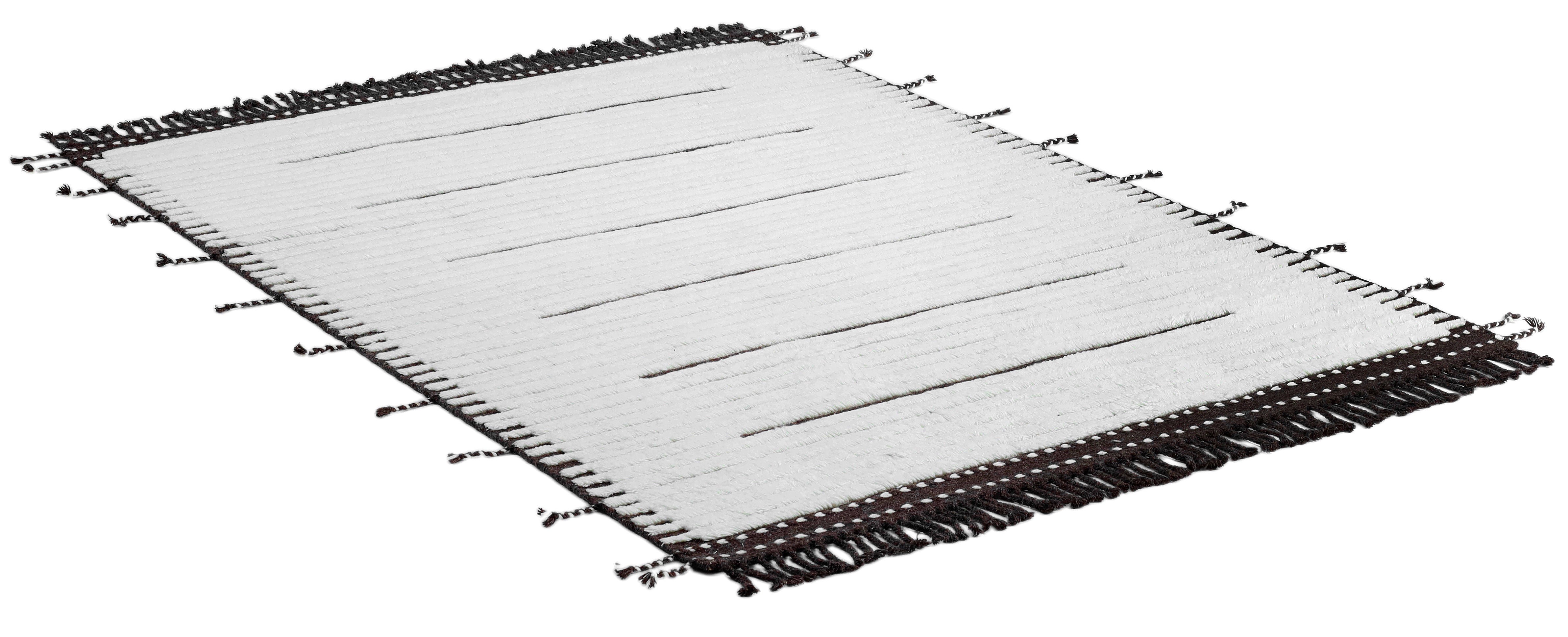 A hand-knotted modern wool rug in a neutral colour combination.