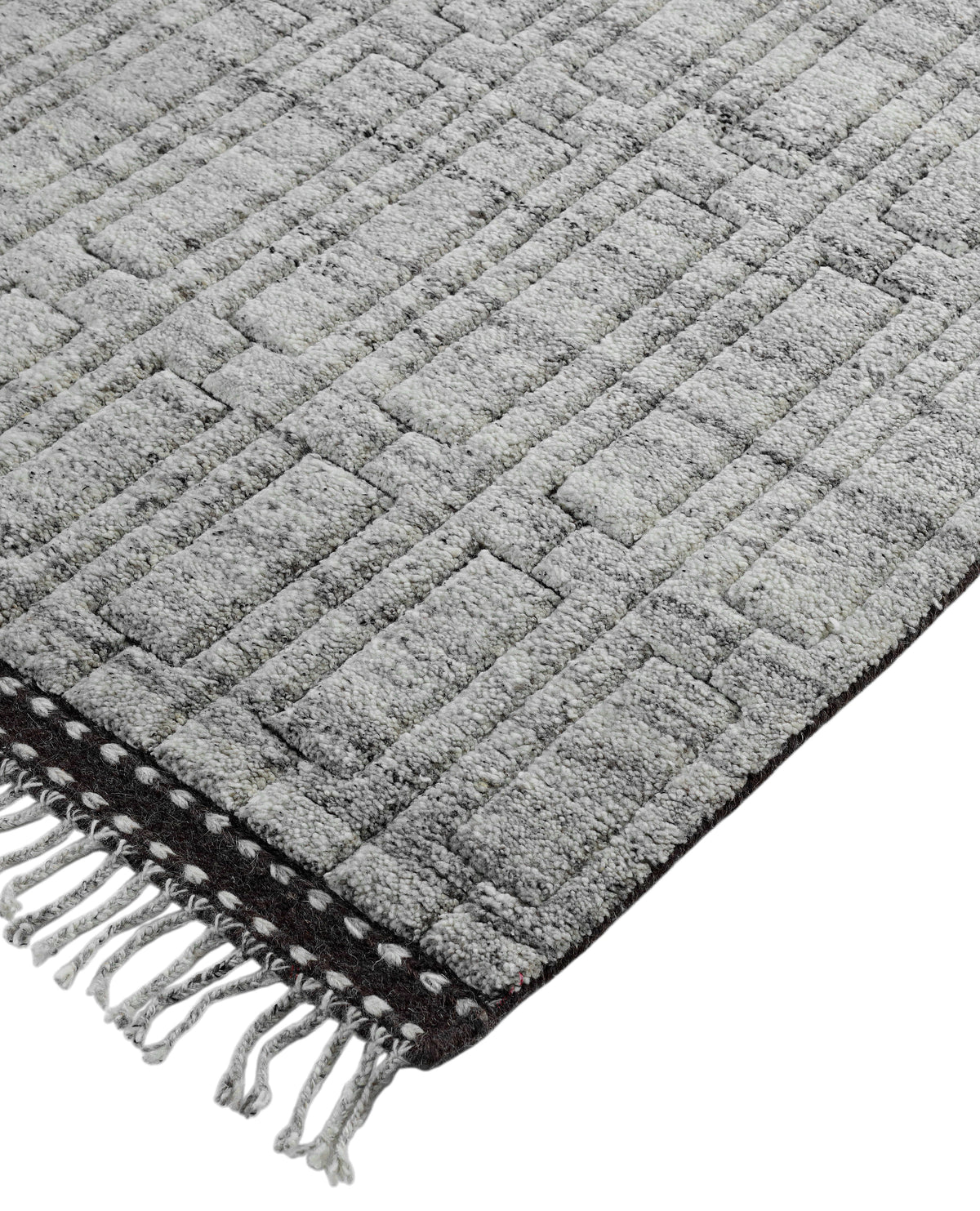 A hand-knotted modern wool rug in a neutral grey colour combination.