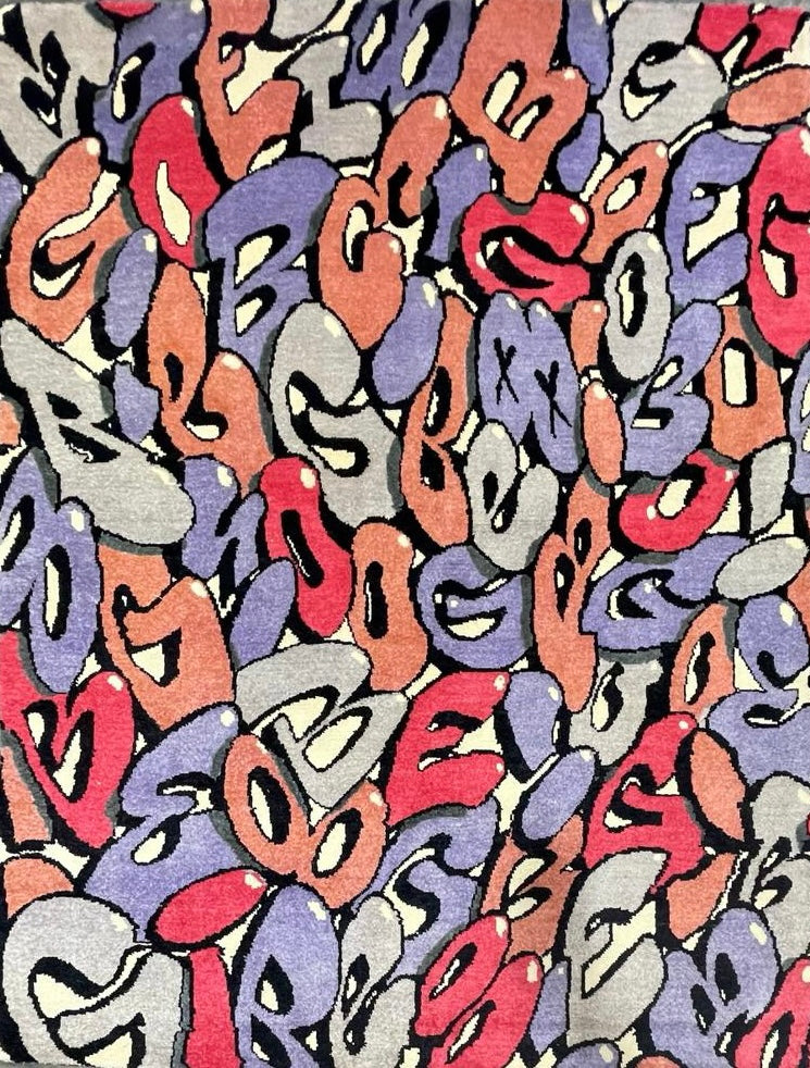A hand-knotted custom rug made by Kasra Rugs and renowned graffiti artist Boogie.