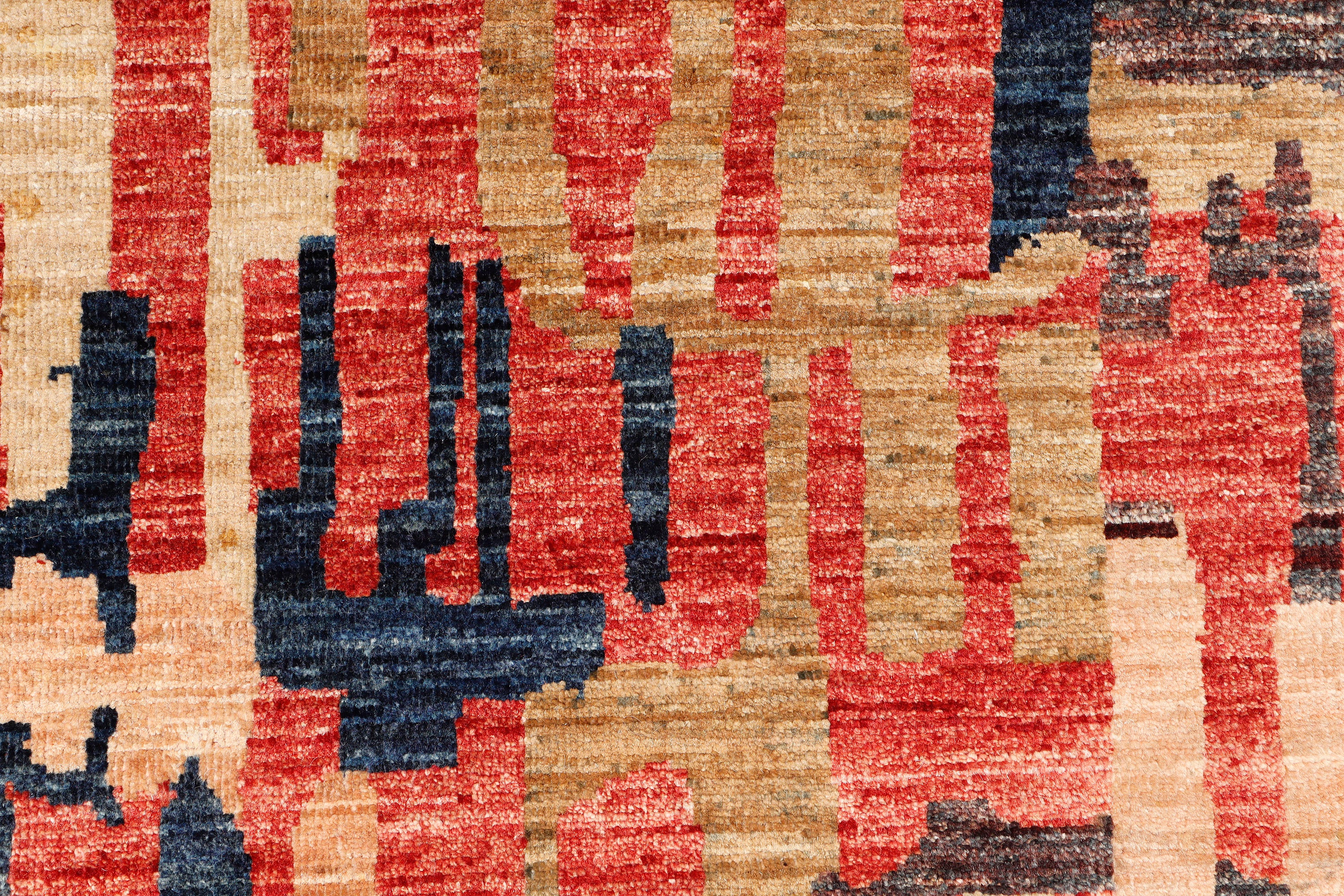 A hand-knotted runner rug featuring a contemporary design.