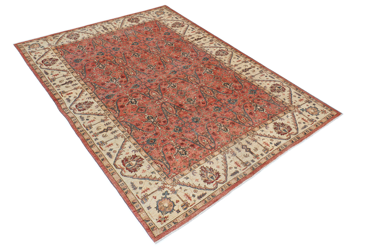 A hand-knotted antique-style 6x8 wool rug.