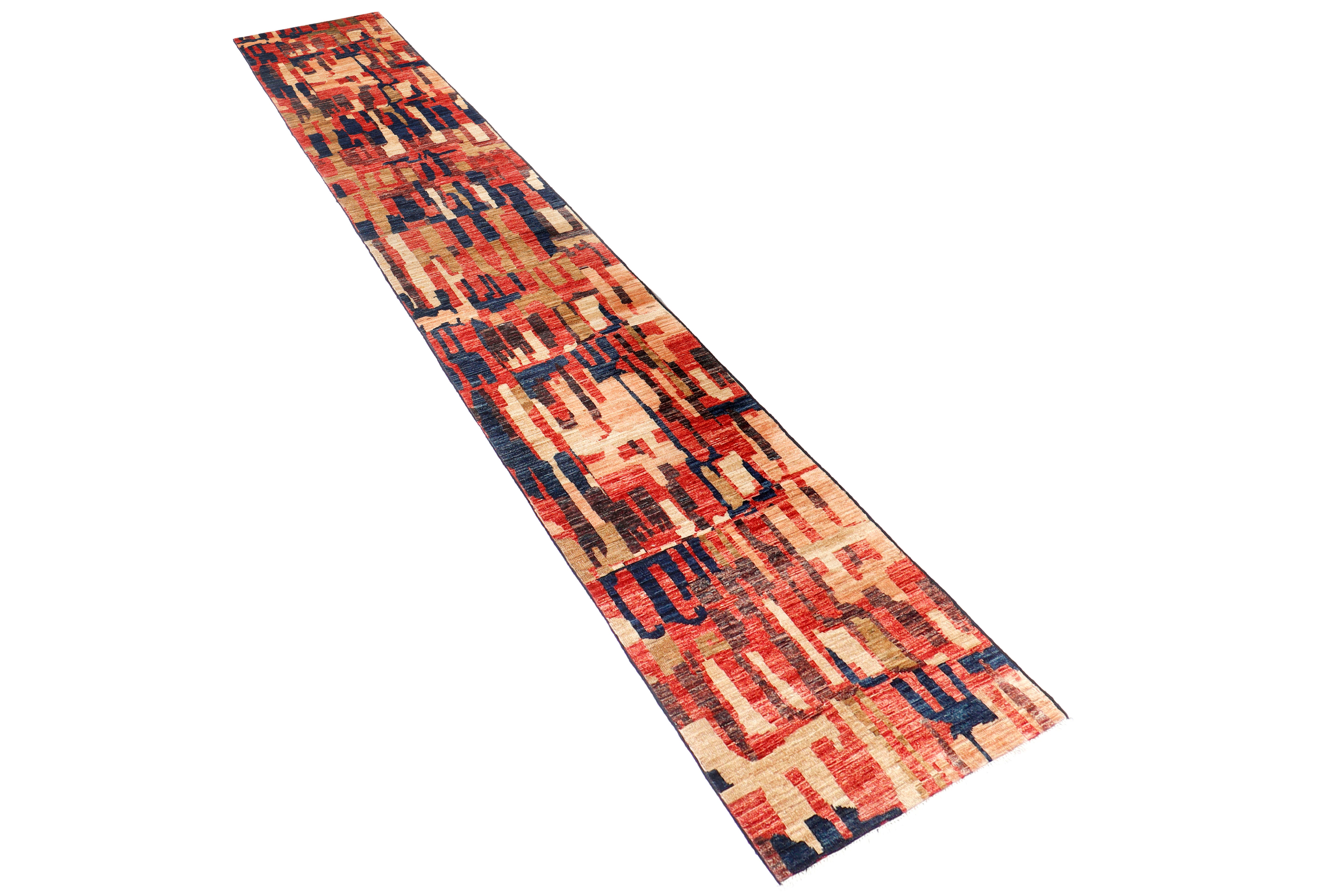 A hand-knotted runner rug featuring a contemporary design.