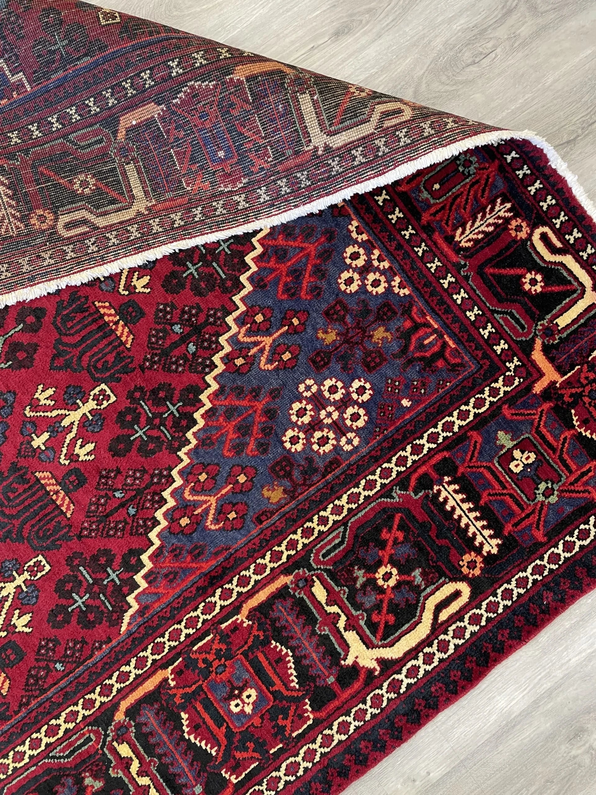 Joshaghan Deep Red Wool Rug (7'0" x 10'4")