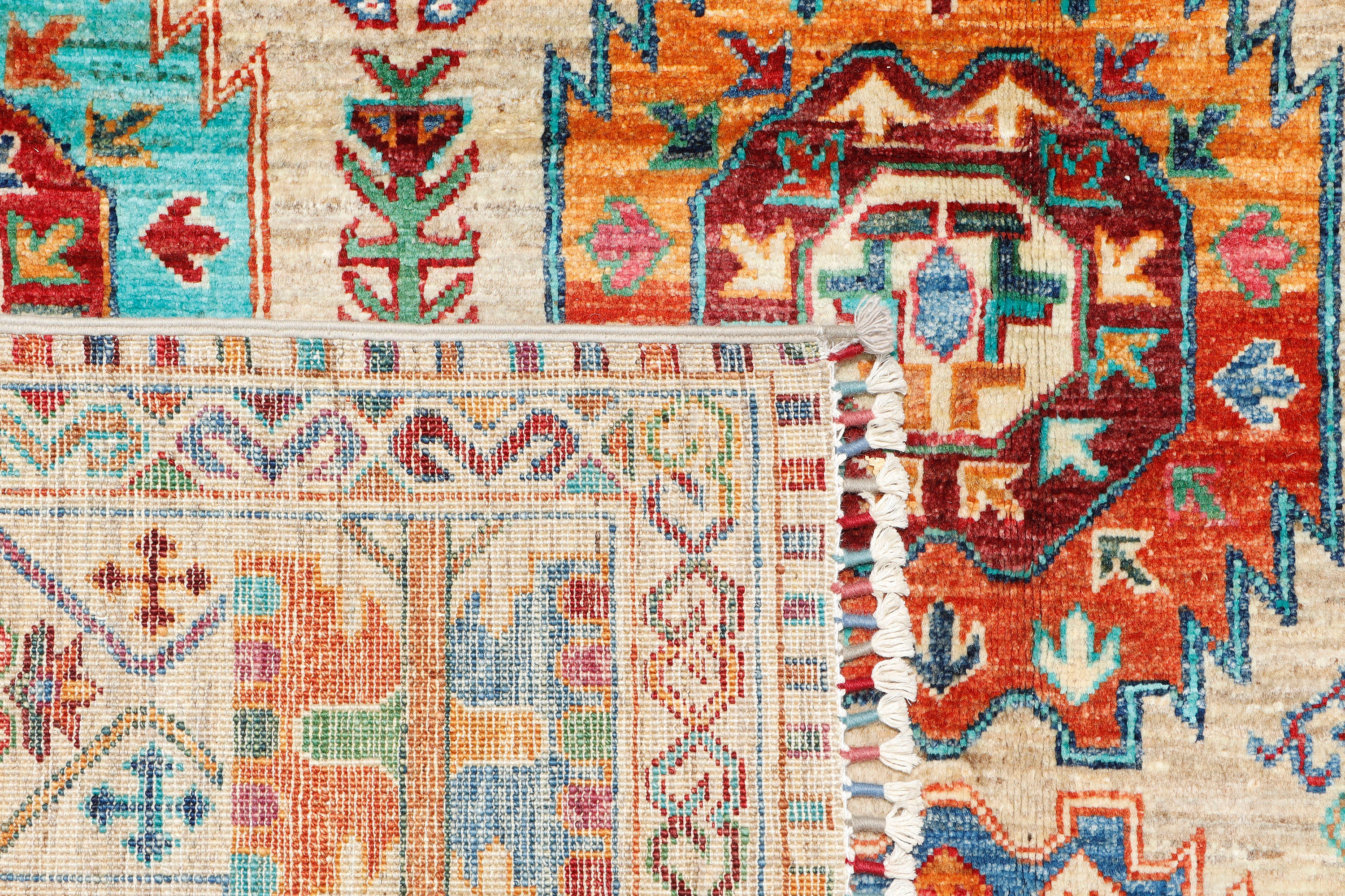 A hand-knotted 7x10 wool rug featuring a contemporary Ersari design.