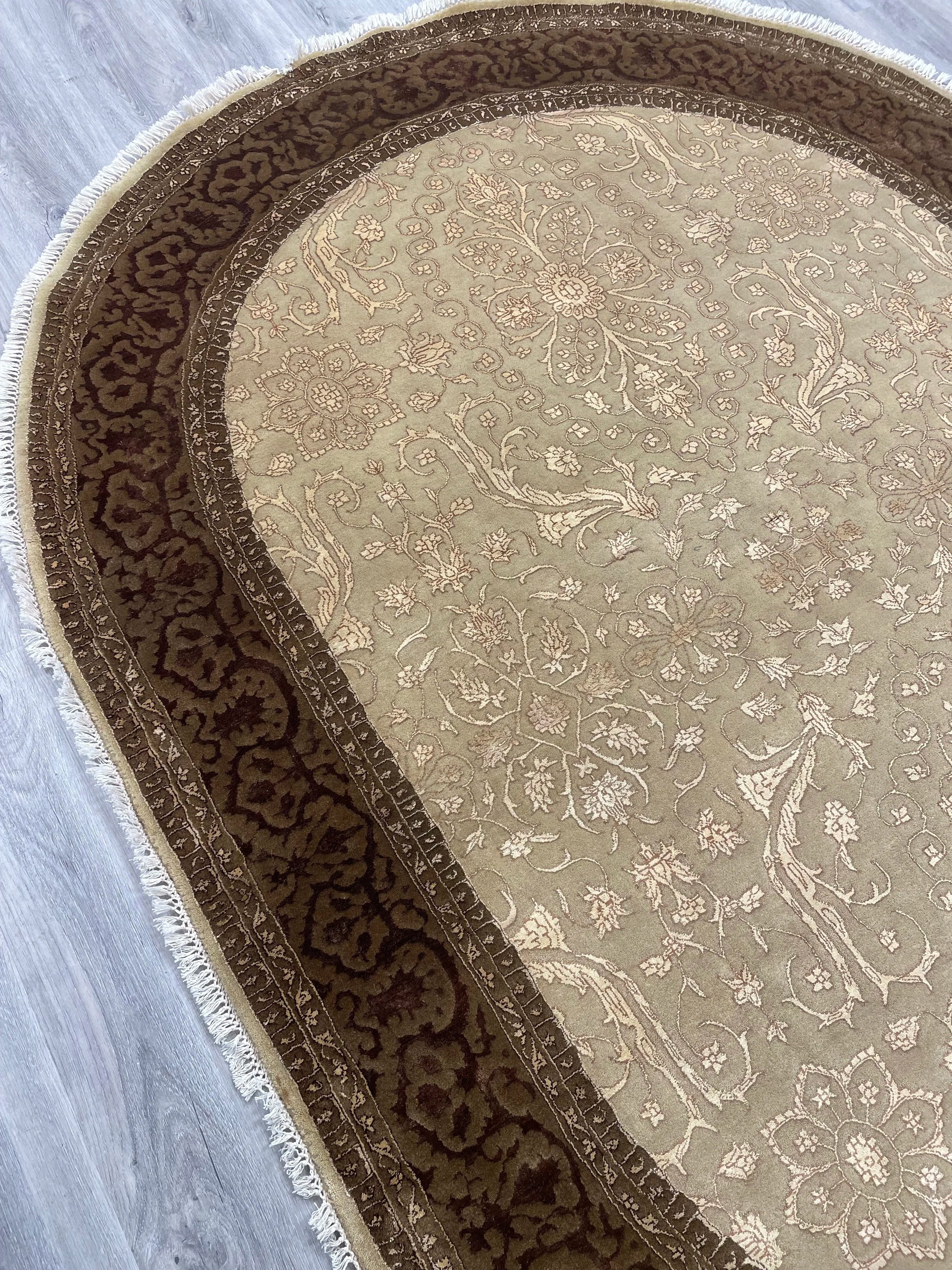 Tabriz Design Oval Wool Rug (5'6" x 7'6")