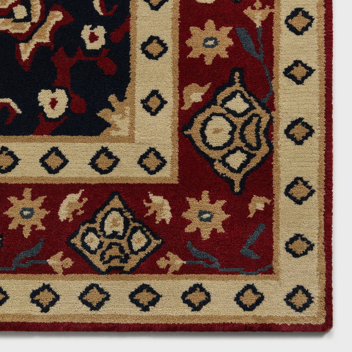 A hand-knotted Yankees rug by Kasra Rugs x Kith in a red colour combination.