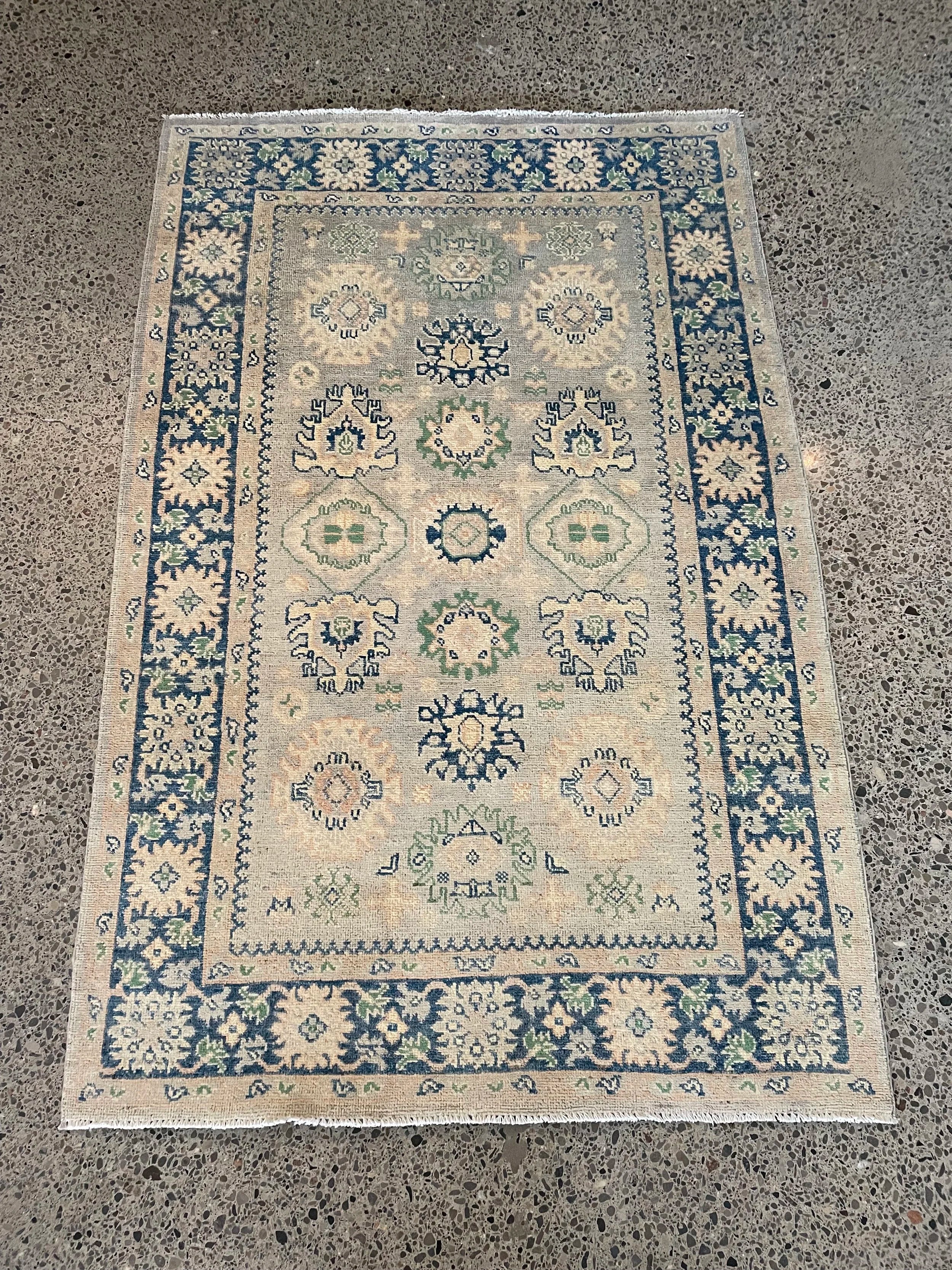 Kazak Wool Rug (4'1" x 6'2")