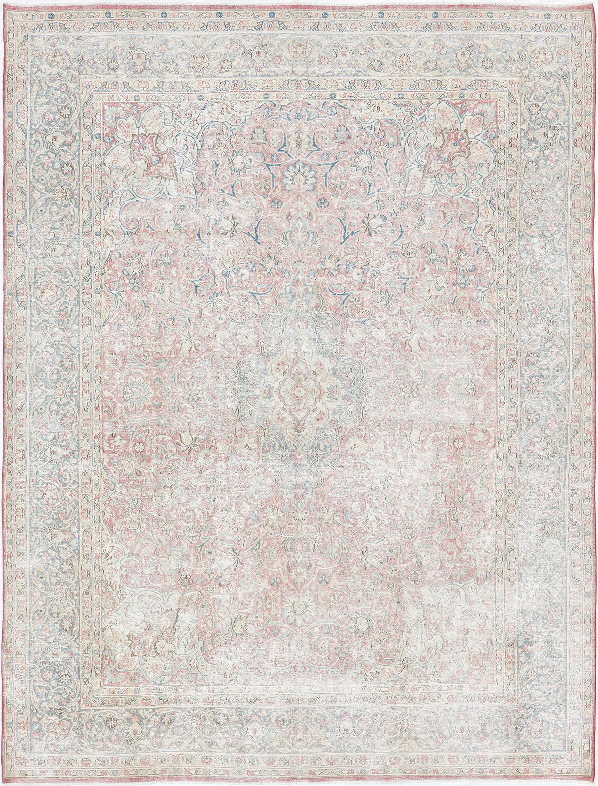A hand-knotted 9x12 vintage wool rug featuring a classic design in a muted colour palette.