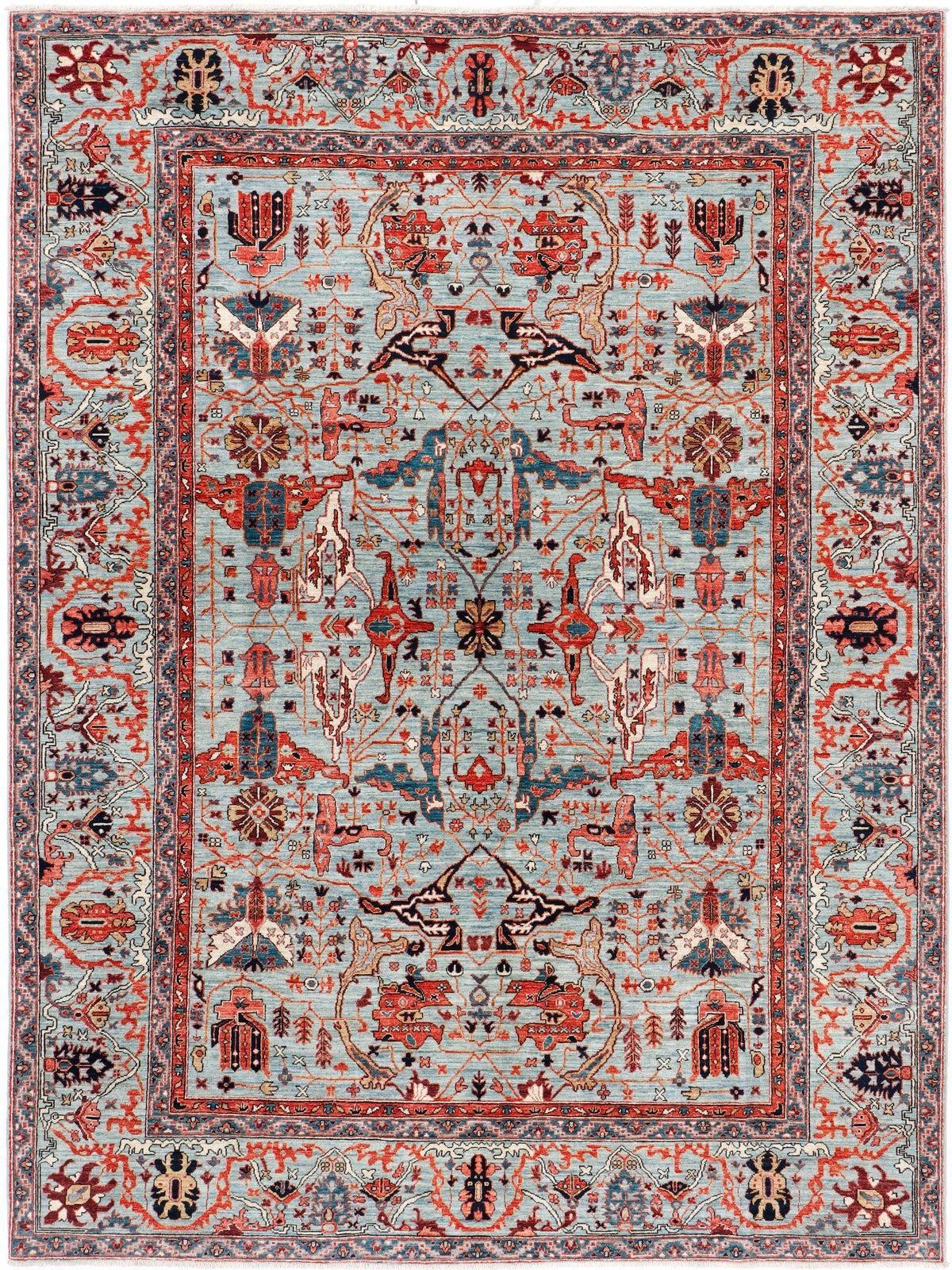 A hand-knotted 8x11 wool rug featuring a classic tribal design in a contemporary colour combination.