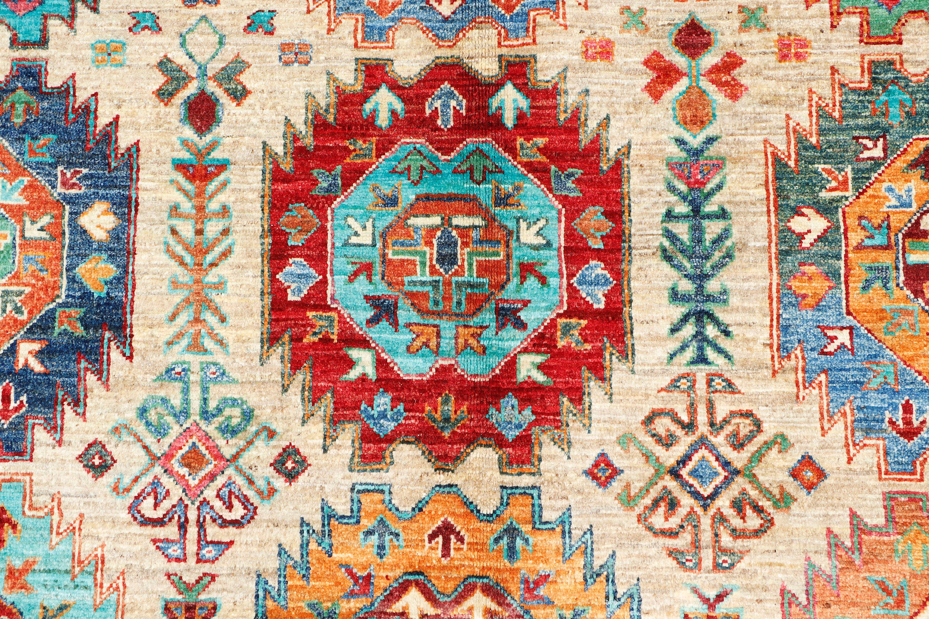 A hand-knotted 7x10 wool rug featuring a contemporary Ersari design.