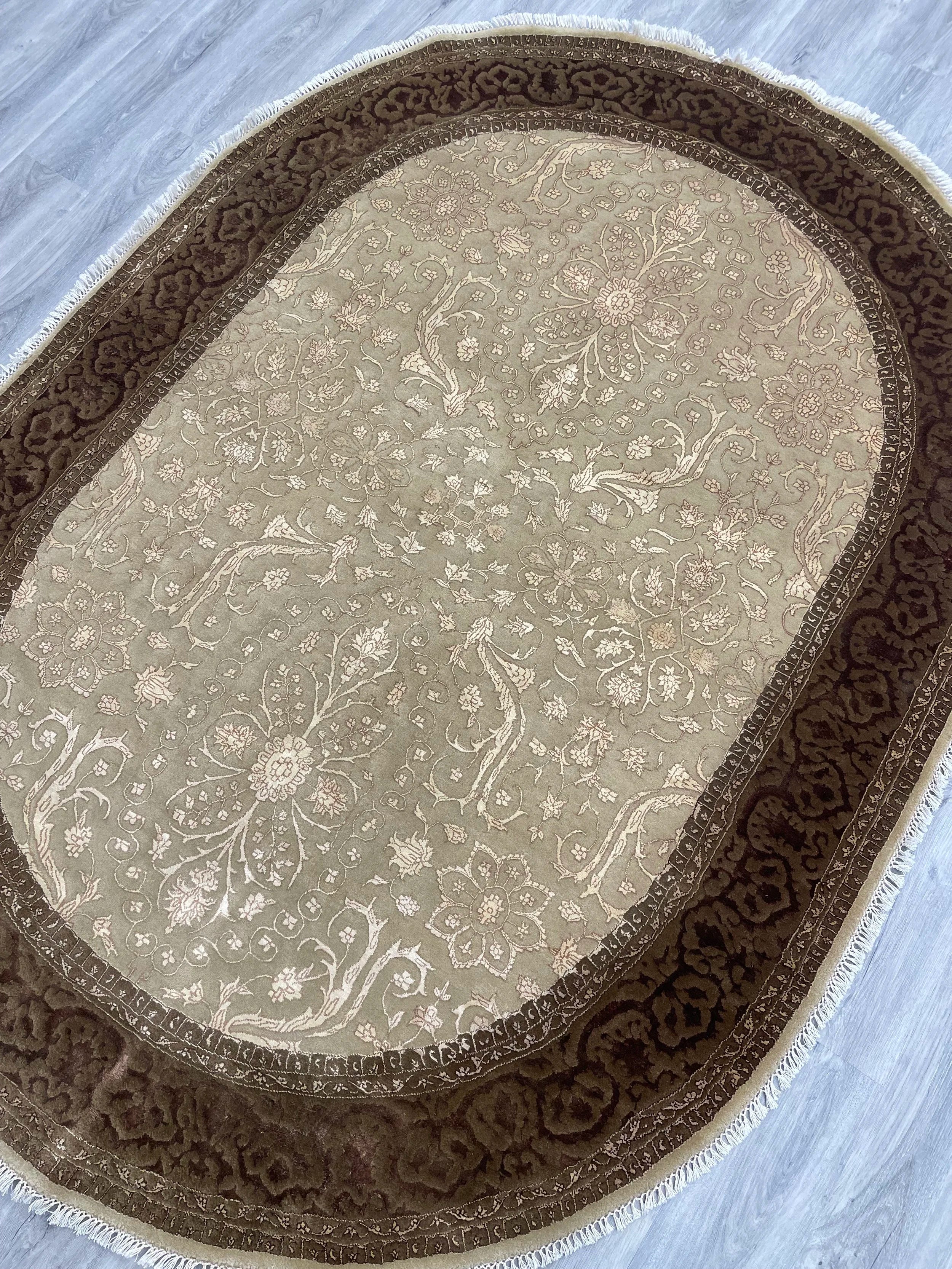 Tabriz Design Oval Wool Rug (5'6" x 7'6")